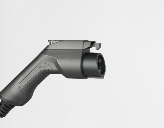 Close-up of BESEN Type 1 Tethered Charging Cable connector, highlighting the precision-engineered pins and durable housing designed to withstand frequent use, ideal for safe and reliable EV charging.