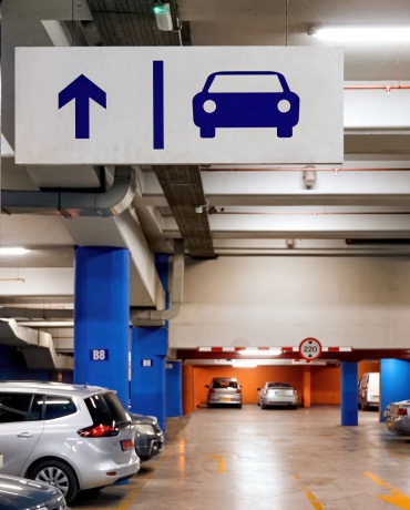 Workplace parking garage, demonstrating where BESEN SQW45 EV charging stations can be installed for employee electric vehicle charging.